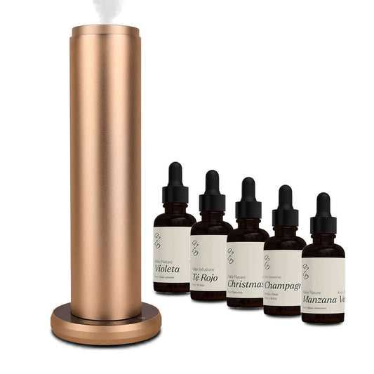 Difusor con varitas de aceite esencial de árbol de té para claridad mental y bienestar.
